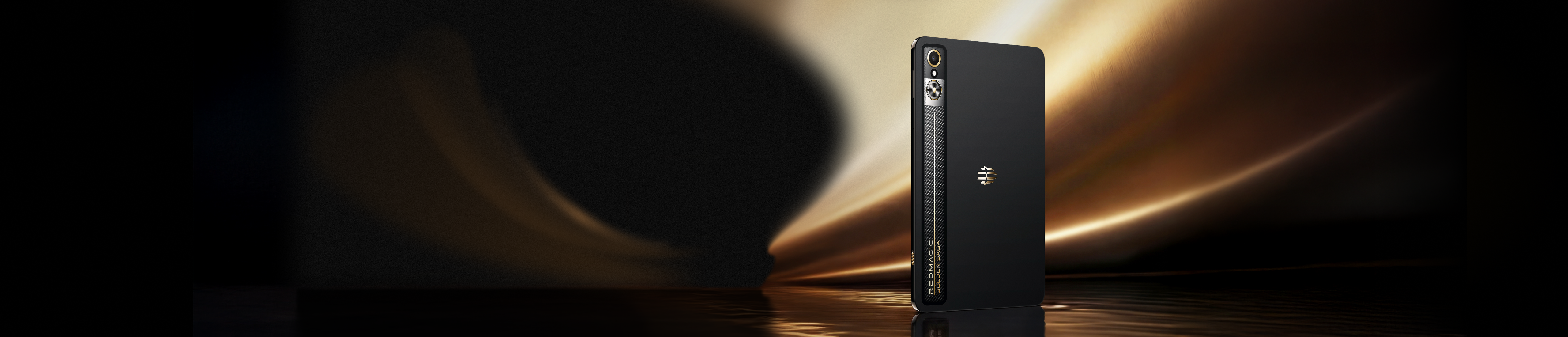 Black smartphone standing upright with a reflective surface and a dark, abstract background with gold light streaks.